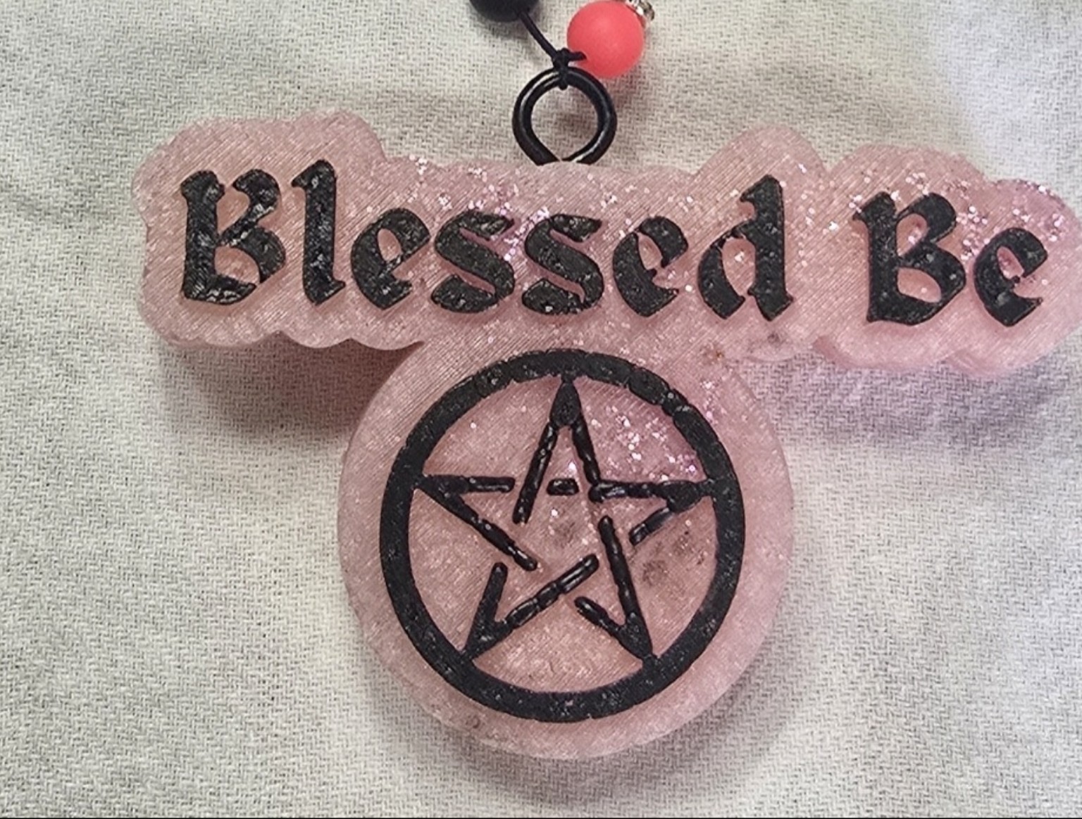Pink Blessed Be witchy car freshie with black pentacle and beaded hanging cord